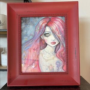 Red Framed Art with Pink and Blue Accents